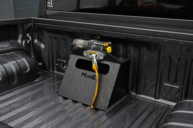 Tall mounting plate for winch for pickup truck bed